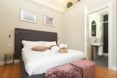 Letto o letti in una camera di N7 Rooms