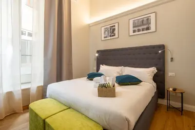 Letto o letti in una camera di N7 Rooms