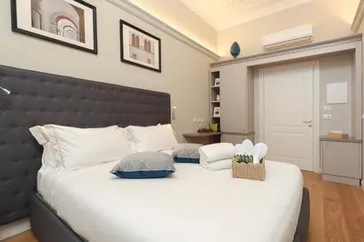 Letto o letti in una camera di N7 Rooms