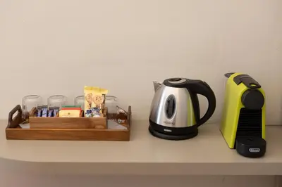 Set per la preparazione di tè e caffè presso N7 Rooms