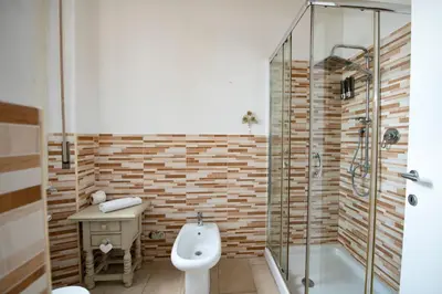 Bagno di Station Family Apartment by Mamo Florence