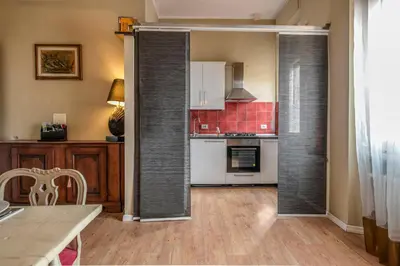 Cucina o angolo cottura di Station Family Apartment by Mamo Florence