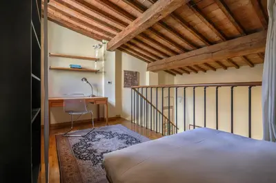Letto o letti in una camera di Charming Apartment in Oltrarno