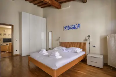 Letto o letti in una camera di Charming Apartment in Oltrarno