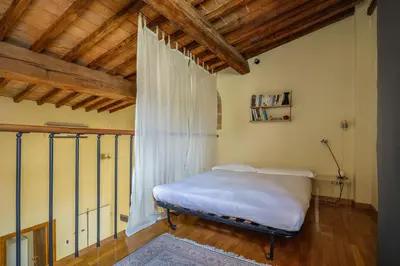 Letto o letti in una camera di Charming Apartment in Oltrarno