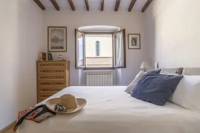 Letto o letti in una camera di Il Presto di San Martino
