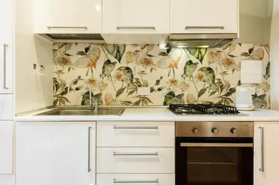 Cucina o angolo cottura di Classic Loft by Mmega