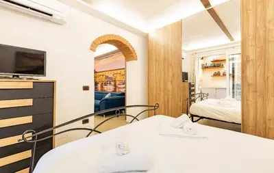Letto o letti in una camera di Da Laura a Ponte Vecchio