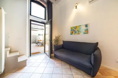 Area soggiorno di La casa di Remo Ground-Floor with a patio