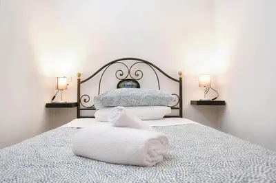 Letto o letti in una camera di Wine Apartments Florence Montepulciano