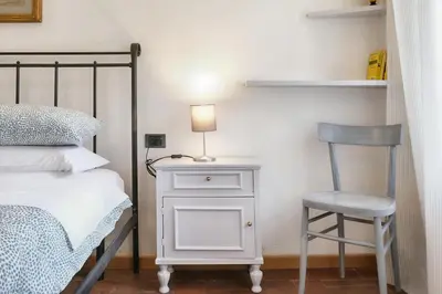 Letto o letti in una camera di Wine Apartments Florence Montepulciano