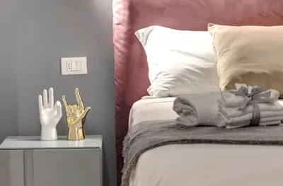 Letto o letti in una camera di Aperol & Spritz Apartments by Mamo Florence