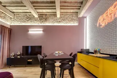 Area soggiorno di Aperol & Spritz Apartments by Mamo Florence