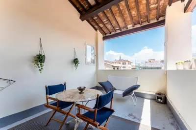 Area soggiorno di La Loggia Loves Apartment