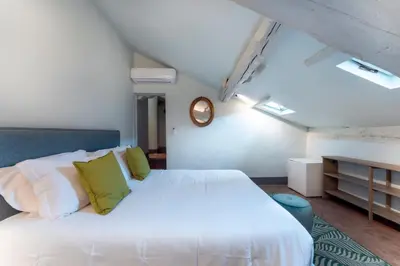 Letto o letti in una camera di La Loggia Loves Apartment