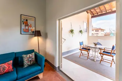 Area soggiorno di La Loggia Loves Apartment