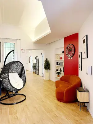 Area soggiorno di CASA IVH BNB