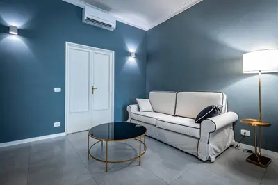 Area soggiorno di YID Lamarmora luxury contemporary apartment