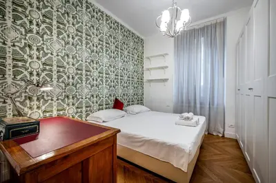 Letto o letti in una camera di YID LUX SUITE BOLOGNESE