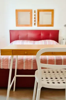 Letto o letti in una camera di Casa Macri