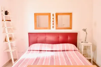 Letto o letti in una camera di Casa Macri