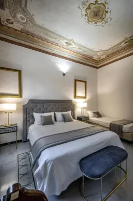 Letto o letti in una camera di YID Gramsci
