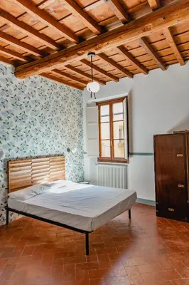 Letto o letti in una camera di Big apartment near Piazza Santo Spirito