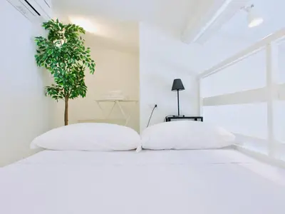 Letto o letti in una camera di Bright studio flat in Oltrarno