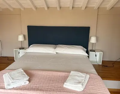 Letto o letti in una camera di Mansarda Salviatino