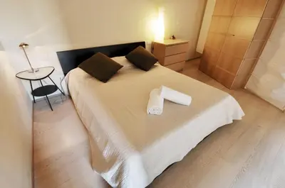 Letto o letti in una camera di Vigna Nuova Suites