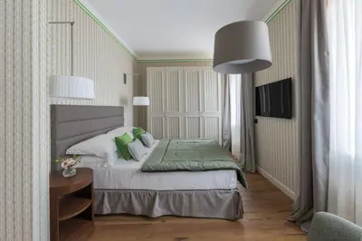 Letto o letti in una camera di Apartments Florence - Palazzo Signoria Luxury Apartments 10- Giuditta