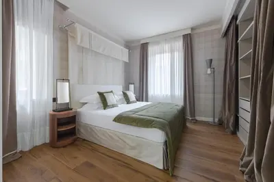Letto o letti in una camera di Apartments Florence - Palazzo Signoria luxury Apartments 11-Medusa