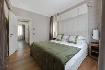Letto o letti in una camera di Apartments Florence - Palazzo Signoria luxury Apartments 11-Medusa