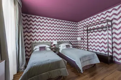 Letto o letti in una camera di Apartments Florence - Palazzo Signoria luxury Apartments 1-Biancone