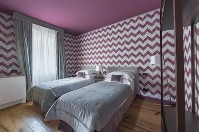 Letto o letti in una camera di Apartments Florence - Palazzo Signoria luxury Apartments