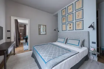 Letto o letti in una camera di Apartments Florence - Palazzo Signoria luxury Apartments 8
