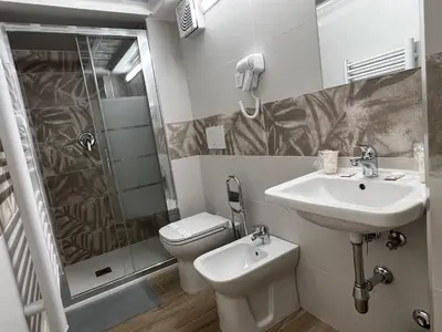 Bagno di AL 106 Apartment [Free Wi-fi 5 min dalla Stazione]