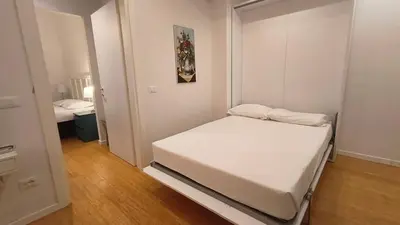 Letto o letti in una camera di Villa Le Statue