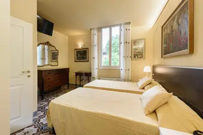 Letto o letti in una camera di B&B Casa Rossa