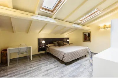 Letto o letti in una camera di B&B Casa Rossa