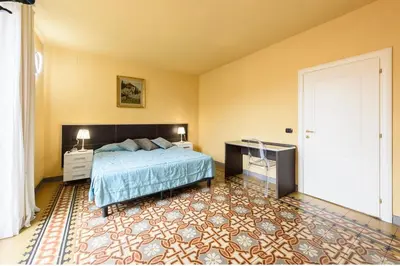 Letto o letti in una camera di B&B Casa Rossa