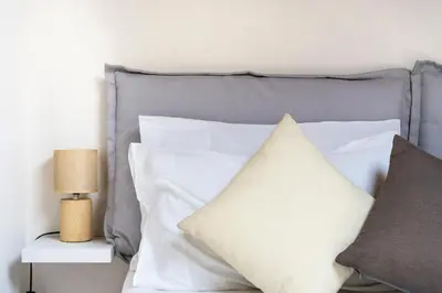 Letto o letti in una camera di [Piazza Santo Spirito] Appartamento con 2 Camere Matrimoniali