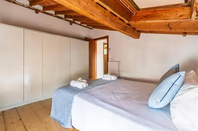 Letto o letti in una camera di [Piazza Santo Spirito] Appartamento con 2 Camere Matrimoniali