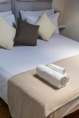 Letto o letti in una camera di [Piazza Santo Spirito] Appartamento con 2 Camere Matrimoniali