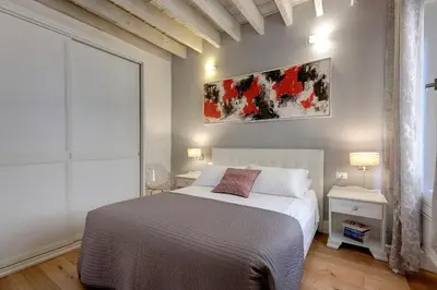 Letto o letti in una camera di De Rustici Apartment