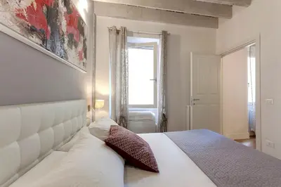 Letto o letti in una camera di De Rustici Apartment
