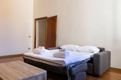 Letto o letti in una camera di Santo Spirito Huge Apartment