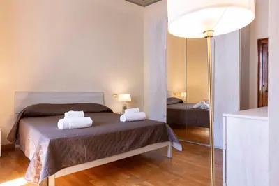 Letto o letti in una camera di Santo Spirito Huge Apartment