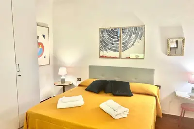 Letto o letti in una camera di Sweet Home Florence