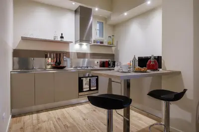 Cucina o angolo cottura di Betty Florence charming modern apartment near Piazza della Libertà